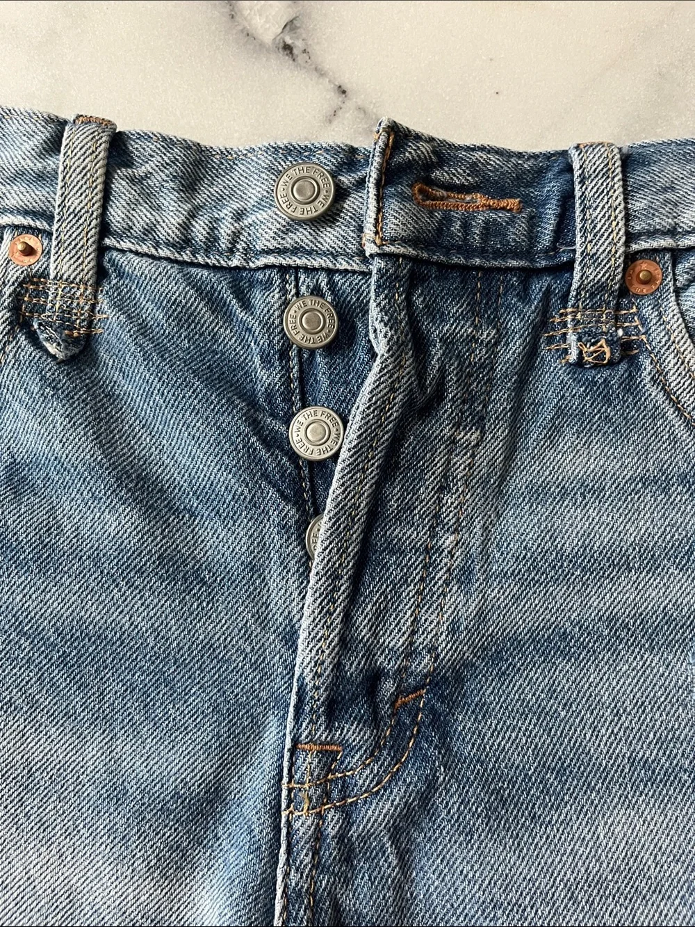 Free People distressed denim shorts